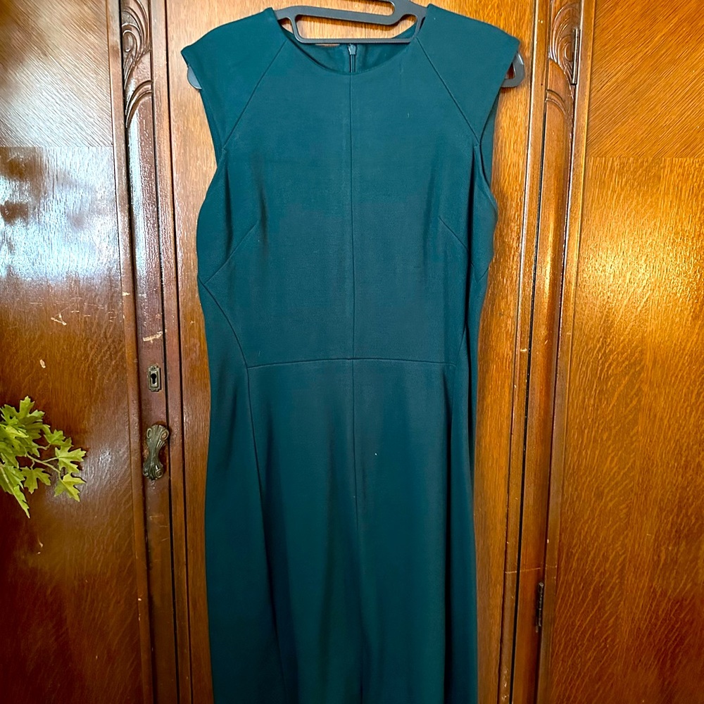 Dark green, knee length work dress.